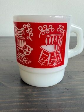 Vintage Anchor Hocking Fire-King milk glass mug
“Homestead" pattern